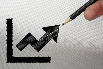 Increasing pension icon on chart paper with hand holding pencil