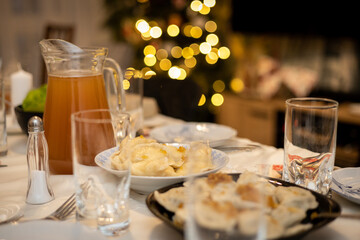 polish christmas dinner table with pierogi