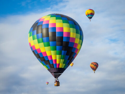 Balloons against clouds and sky, Mass Ascension, Albuquerque International Balloon Fiesta, New Mexico