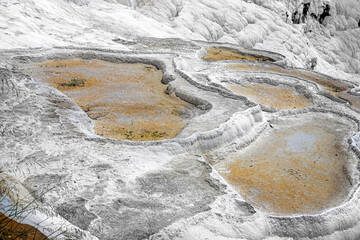 View of dry traventines in Pamukkale on a sunny summer day. Turkey