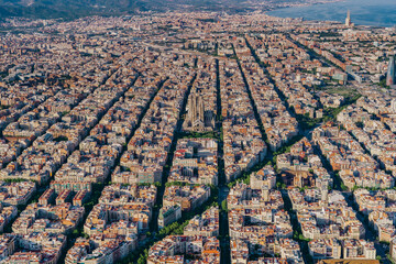 Aerial view of typical buildings of Barcelona cityscape from helicopter. top view, Eixample...