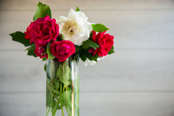 bouquet of beautiful white and red on table