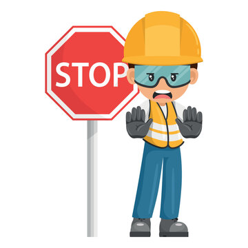 Upset industrial worker holding stop sign. Worker with his personal protective equipment. Industrial safety and occupational health at work