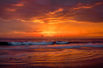 Dramatic sunset sky above ocean