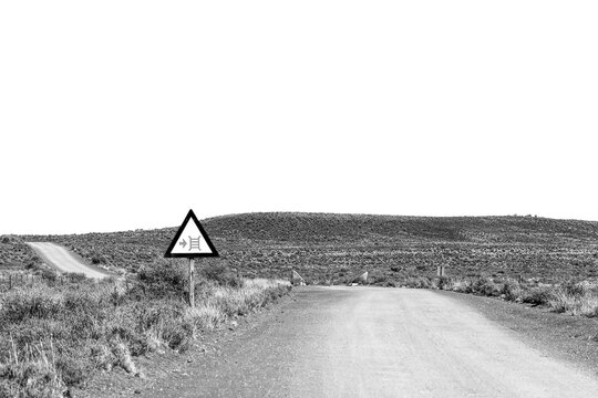 Cattle grid road sign on road R356. Monochrome