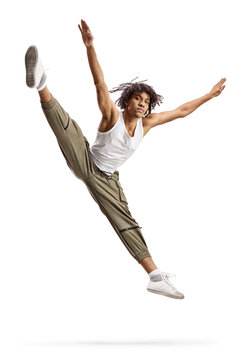 African american male dancer jumpng and performing a split leap