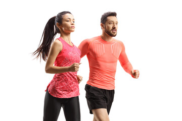 Young man and woman in sportswear running together