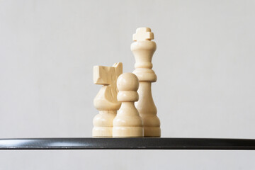 Product presentation of a pawn, knight and king