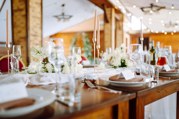 Table set for wedding or another catered event dinner ceremony. Wedding, birthday, party, event concept.