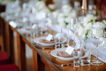 Table set for wedding or another catered event dinner ceremony. Wedding, birthday, party, event concept.