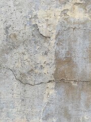 Obraz na płótnie Canvas Beige grunge old wall texture. Beige grungy background of natural cement or stone old texture as a retro pattern wall. It is a concept or metaphor wall banner, grunge, material or aged.Cement wall.