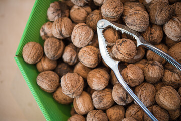Bucket of Greek Walnuts and Nutcracker