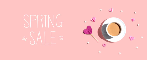 Spring sale message with a cup of coffee and paper hearts - flat lay