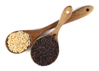 Integral white and organic black rice in wooden spoon isolated on white, top view