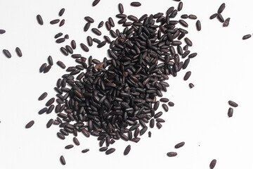 Black rice on a white background