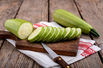 Zucchini on a wooden background