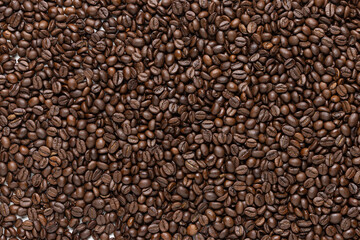 Background of coffee beans.
Macro Photography of roasted coffee beans Robusta variety, used for Italian Espresso - Detailed Texture, High Resolution
