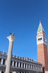 Fototapeta na wymiar Venice beaches, gondolas, churches, St. Mark's City Square, the tower in the square, the church, the medieval and Roman artifacts, the canals in the city, the gondolas going on the canals and the sea,