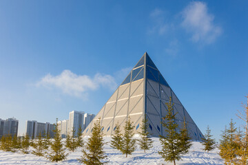 Palace of Peace and Accord. Modern architectural urbanistic city Astana. Futuristic building...