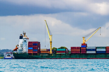 View of the cargo port and cargo ships in Stone town. Zanzibar, Tanzania