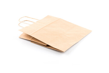 Paper shopping bag on white