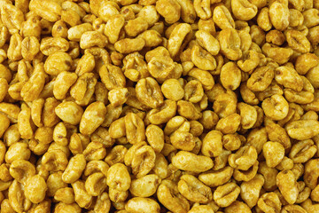 Dry breakfast caramel flavored wheat cereal close-up