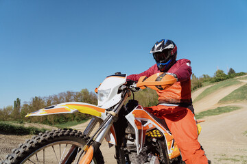 Extreme and Adrenaline. Motocross rider close up portrait. Motocross sport. Active lifestyle.