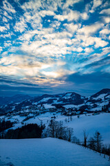 Fototapeta na wymiar mountain landscape near the village of maria neustif in upper austria on an evening in winter