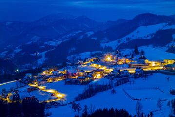 mountain landscape near the village of maria neustif in upper austria on an evening in winter