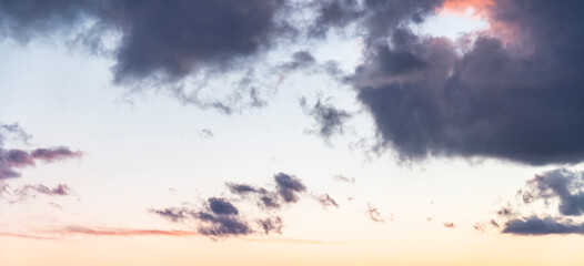 Beautiful bright orange sunset sky with clouds. Sunset sky with clouds background.