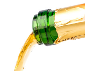 Close-up of a bottle and pouring of sparkling wine on a transparent background. isolated object....