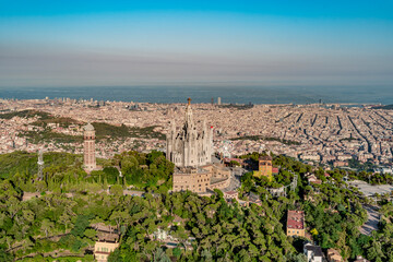 Aerial view of Temple of the Sacred Heart of Jesus of Barcelona. Cityscape from helicopter. top...