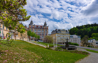 Goethe square and public park with fountain and spa houses in spring - center of Marianske Lazne (Marienbad) - great famous spa town in the west part of the Czech Republic (region Karlovy Vary)