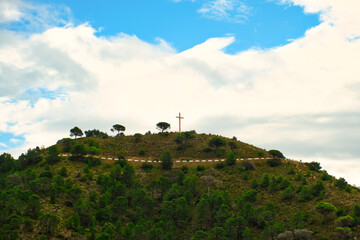 Fototapeta na wymiar Benidorm Cross La Cruz at the top of Sierra Gelada Natural Park in Benidorm, Costa Blanca, Spain