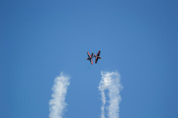 Fototapeta na wymiar airplane in the sky, aerobatics