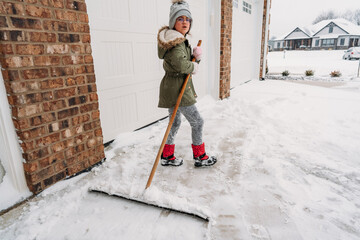 A girl turned around with an innocent facial expression. 