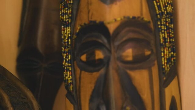 Black Stock Footage of historic African Art, Masks, Artifacts, and Sculptures in a home museum showcasing the diversity of African descendents, cultures, and creativity