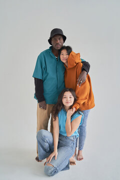 Asian woman near diverse friends