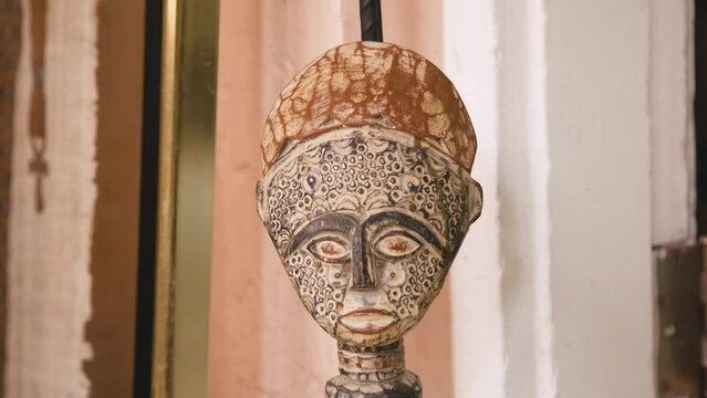 Black Stock Footage of historic African Art, Masks, Artifacts, and Sculptures in a home museum showcasing the diversity of African descendents, cultures, and creativity