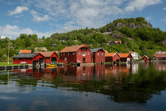 Coastal town. Red garages for boats  in Norway