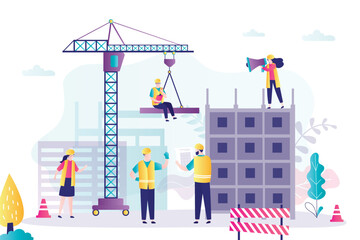 Construction site, tower crane builds a house. Building and construction process. Group of workers in uniform and engineers at a construction site. Teamwork.