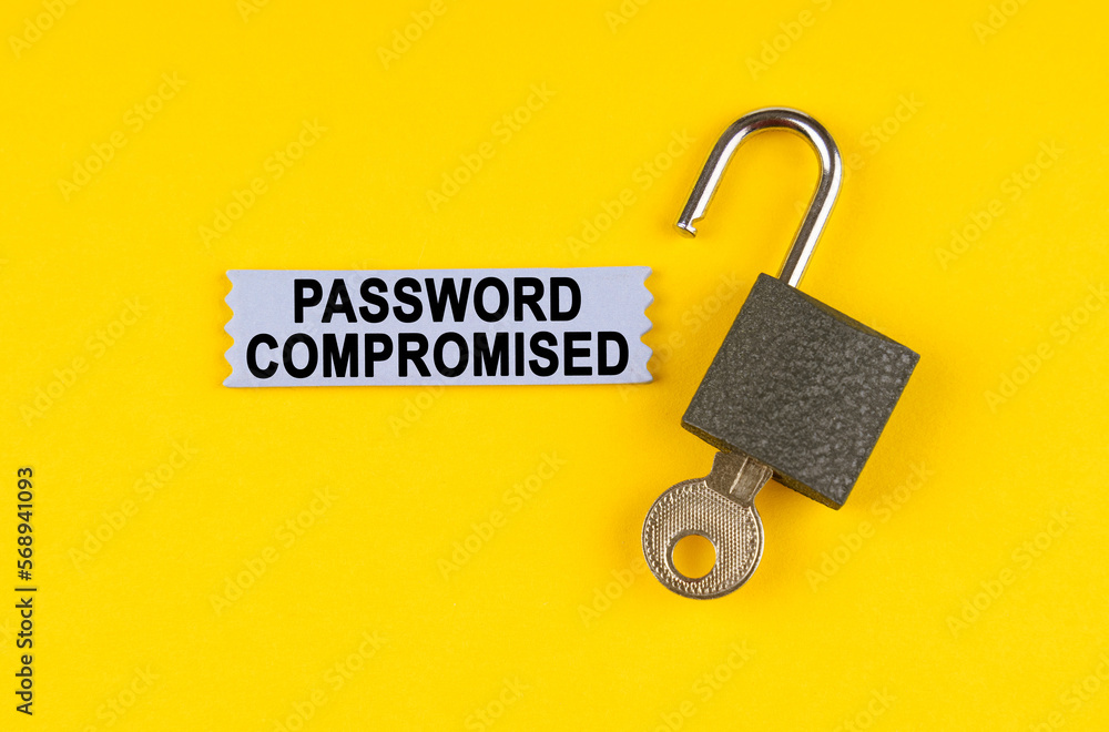 Poster on the yellow surface lies an open lock with a key, next to it is a sticker with the inscription - p
