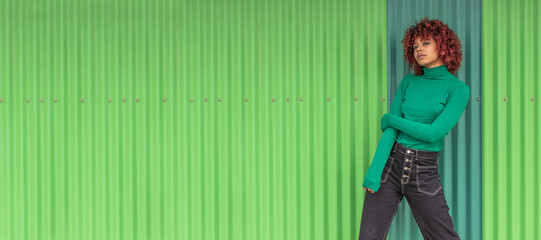 girl on the street outdoors on green background