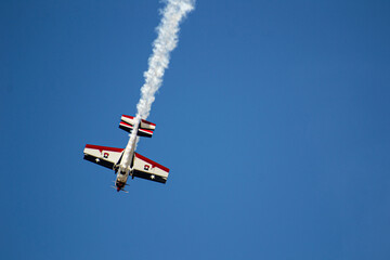 Fototapeta na wymiar aerial acrobatics, two planes in one