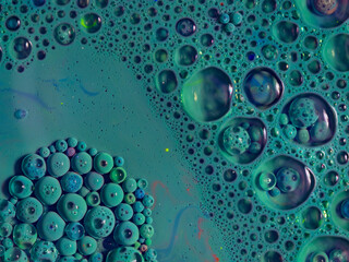 watercolors and oil artistic macro photography, behaviour of oil and water when brought together