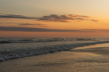 Orange and golden sunset sky calmness tranquil relaxing sunlight summer mood. , Jaguaruna Beach, Santa Catarina , Brazil