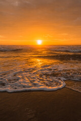 Sea sunrise with beautiful cloudscape over the beach