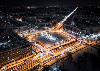 Long exposure (traffic lights), aerial view of Nowa Huta at night during Christmas time, Krakow,...