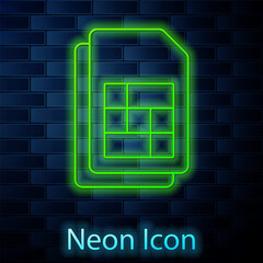 Glowing neon line Sim card icon isolated on brick wall background. Mobile cellular phone sim card chip. Mobile telecommunications technology symbol. Vector
