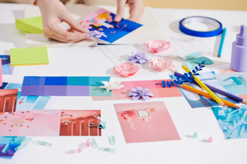 Papercut handmade artist works with sketches on the desk for creative